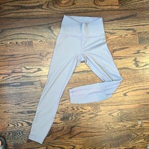 Lululemon leggings. Size 4. Purple/gray. Mesh along sides. Excellent condition.